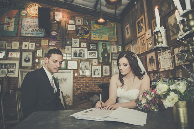 Bride and Groom signing the register at Katys Palace Bar Johannesburg Wedding Venue