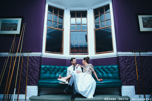 Bride and Groom on a Couch at Cape Town Club Wedding Venue Duane Smith Photography