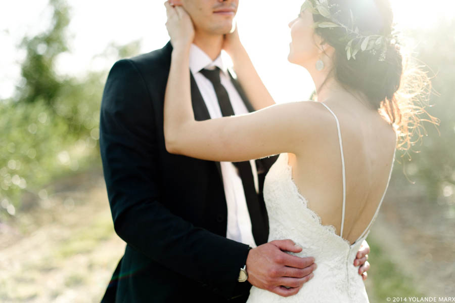 Bride and groom embracing one another