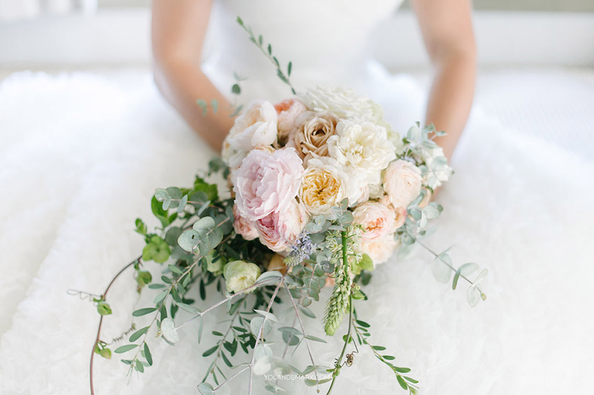 Wedding bouquet being held by bride