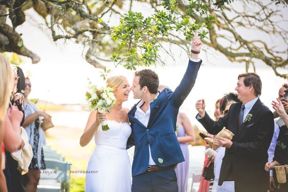 Groom embraces his bride at Mosaic Wedding Venue, Stanford, Western Cape South Africa
