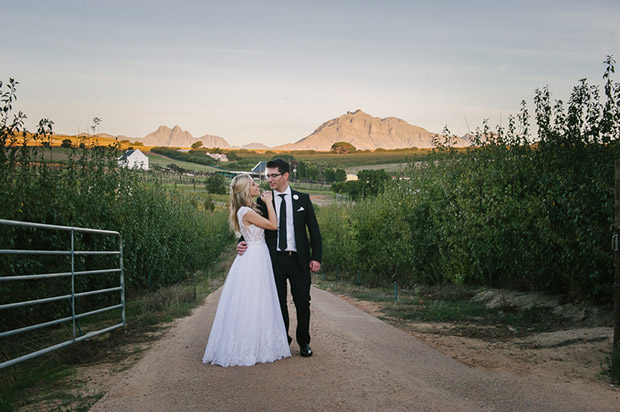 Wedding Couple on Gravel Road at Brenaissance Wine Estate Stellenbosch