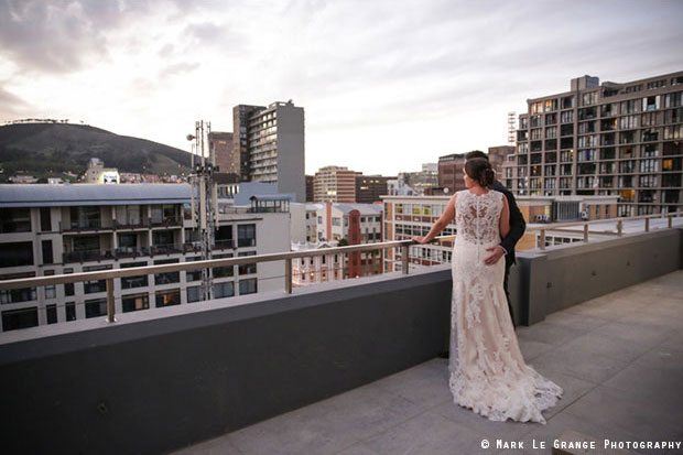 Wedding Couple Looking Out Over Buildings Mark Le Grange Photography Cape Town Wedding Venue East City Studios