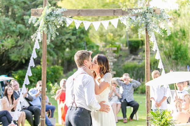 Groom Kissing The Bride at Old Mac Daddy Wedding Venue Cape Town