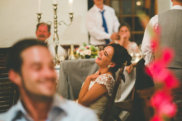 Bride Laughing during Speeches