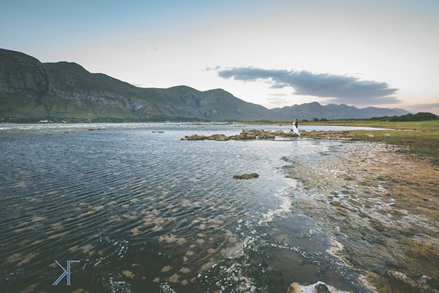 Bride and Groom Photograph alongside the lagoon at Mosaic Wedding Venue