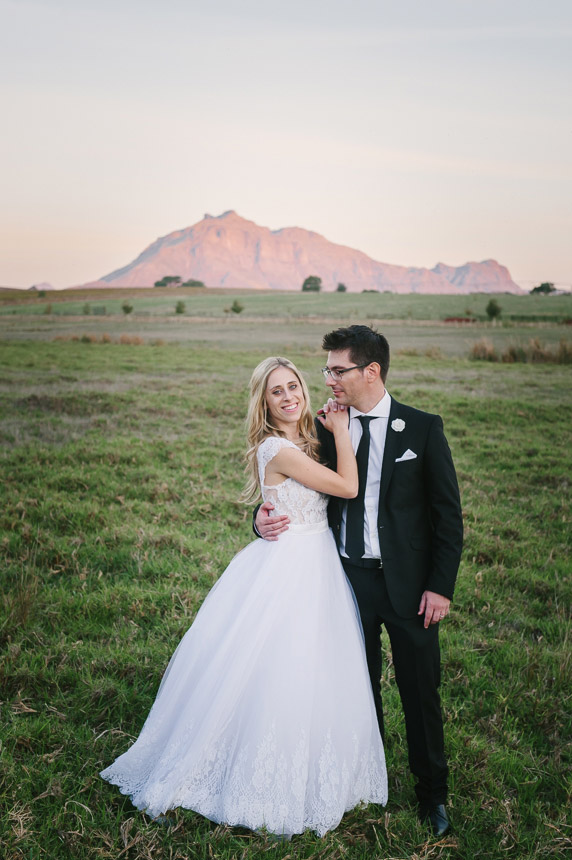 Bride and Groom in Field at Brenaissance Winelands Wedding Venue