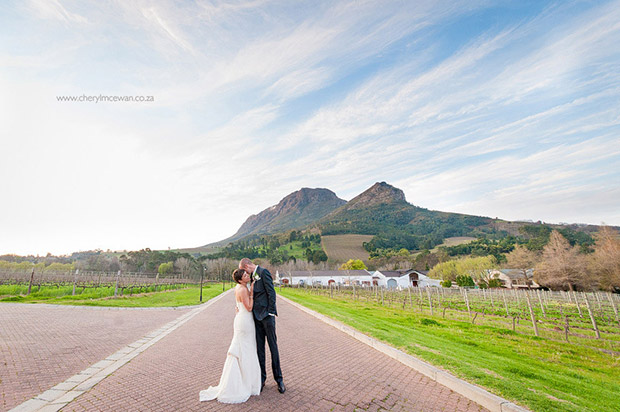 BRide and Groom enjoy the mountain views at Zorgvliet